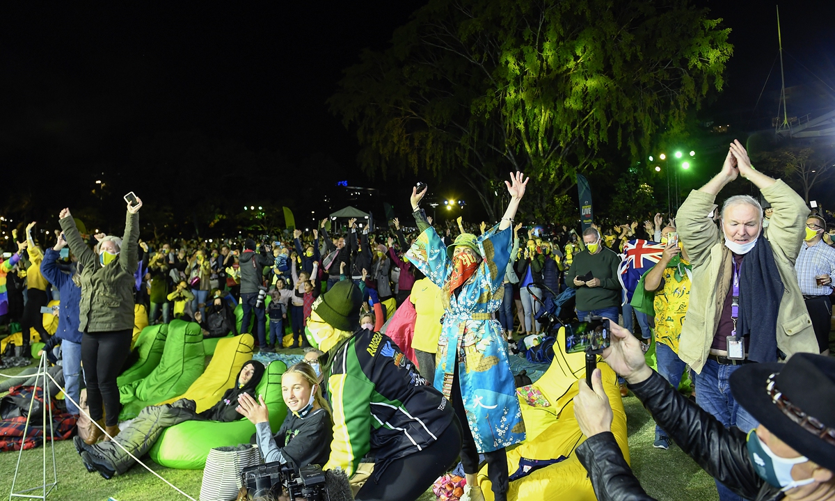 Spectators celebrate after Brisbane was announced the host of the 2032 Olympics on Wednesday in Brisbane. Photo: VCG
