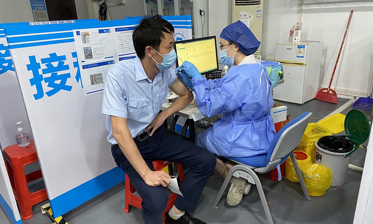 A resident is being vaccinated with COVID-19 vaccine in Zhongshan, South China's Guangdong Province on June 23, 2021. Photo: CFP