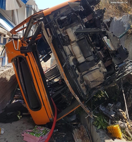 An overturned minibus is seen at the accident site on Capri island, Italy, on July 22, 2021. At least one was killed and 28 were injured after the minibus went off the road on the Italian island of Capri on Thursday, according to local sources.Photo:Xinhua