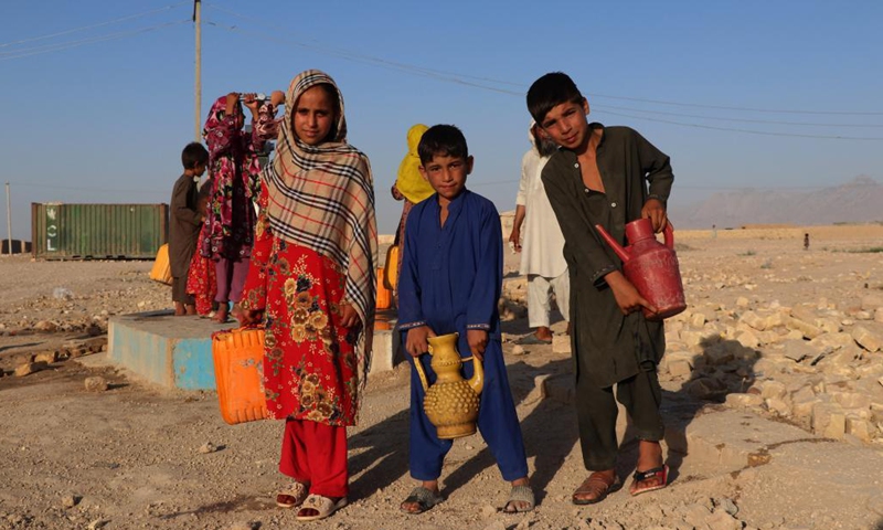 People get water from a hand pump at a displaced person camp in Mazar-i-Sharif, capital of northern Balkh province, Afghanistan, on July 22, 2021.Photo:Xinhua