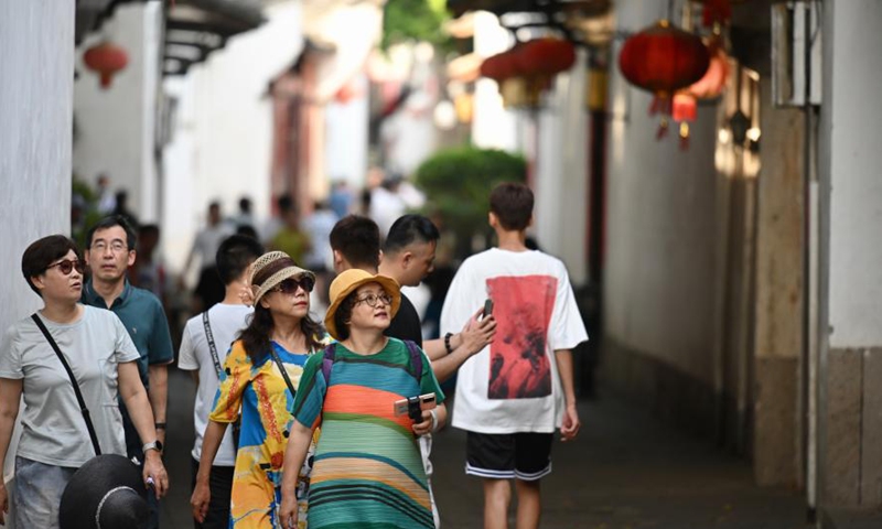 People visit the historical and cultural block of Sanfangqixiang (Three Lanes and Seven Alleys) in Fuzhou, southeast China's Fujian Province, July 11, 2021.Photo:Xinhua