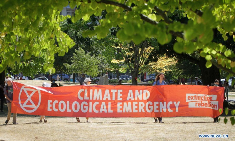Protesters rally against ecological destruction in Vancouver, Canada ...