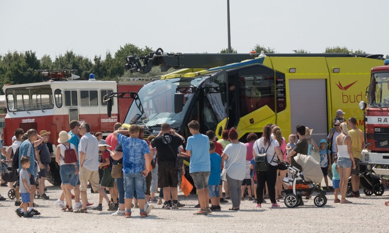 People view a Rosenbauer Panther special rescue truck designed for airport use during a fire truck demonstration at the Aeropark open-air aviation museum in Budapest, Hungary, on July 24, 2021.(Photo: Xinhua)