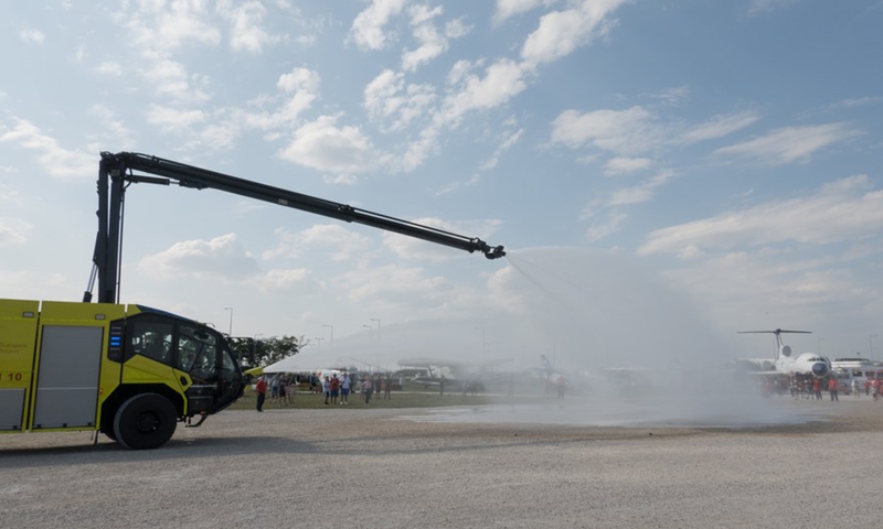 A Rosenbauer Panther special rescue truck designed for airport use sprays water during a fire truck demonstration at the Aeropark open-air aviation museum in Budapest, Hungary, on July 24, 2021.(Photo: Xinhua)