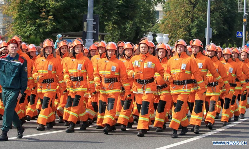 Firefighting personnel participate in an event honoring firefighters and rescuers in Minsk, Belarus, July 24, 2021.(Photo: Xinhua)