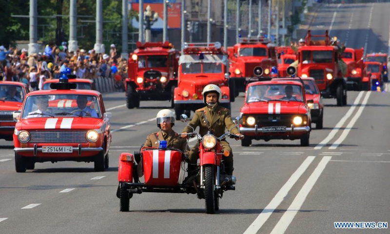 Vehicles are seen during an event to honor firefighters and rescuers in Minsk, Belarus, July 24, 2021.(Photo: Xinhua)