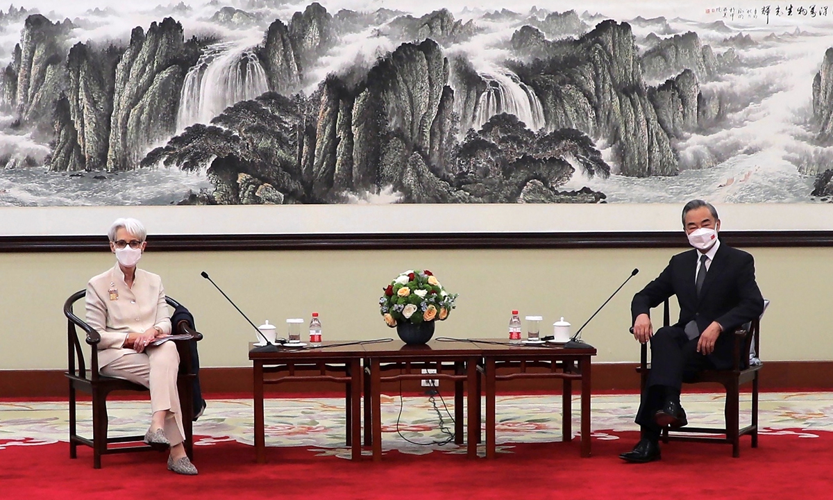 Chinese State Councilor and Foreign Minister Wang Yi (right) meets with visiting US Deputy Secretary of State Wendy Sherman on Monday in Tianjin. Photo: AP