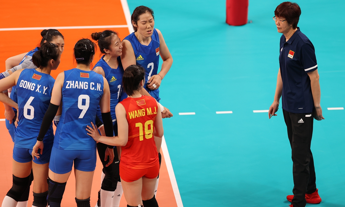 Zhu Ting (No.2) of Team China and Ding Xia (No.16) celebrate a point against Team United States during the women's preliminary - Pool B volleyball on Day 4 of the Tokyo 2020 Olympic Games at Ariake Arena on July 27, 2021 in Tokyo, Japan. Photo: VCG