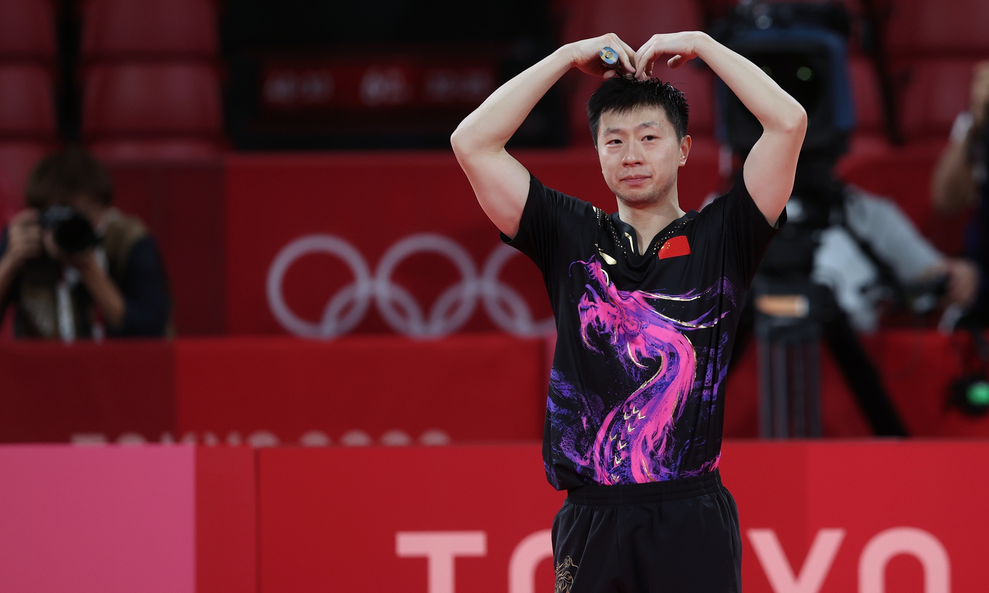 China's Ma Long became the first male table tennis player to win back-back Olympic titles in singles competition after outclassing world No. 1 and teammate Fan Zhendong 4-2 in the final at the Tokyo Olympic Games on Friday.Photo:Cui Meng/GT