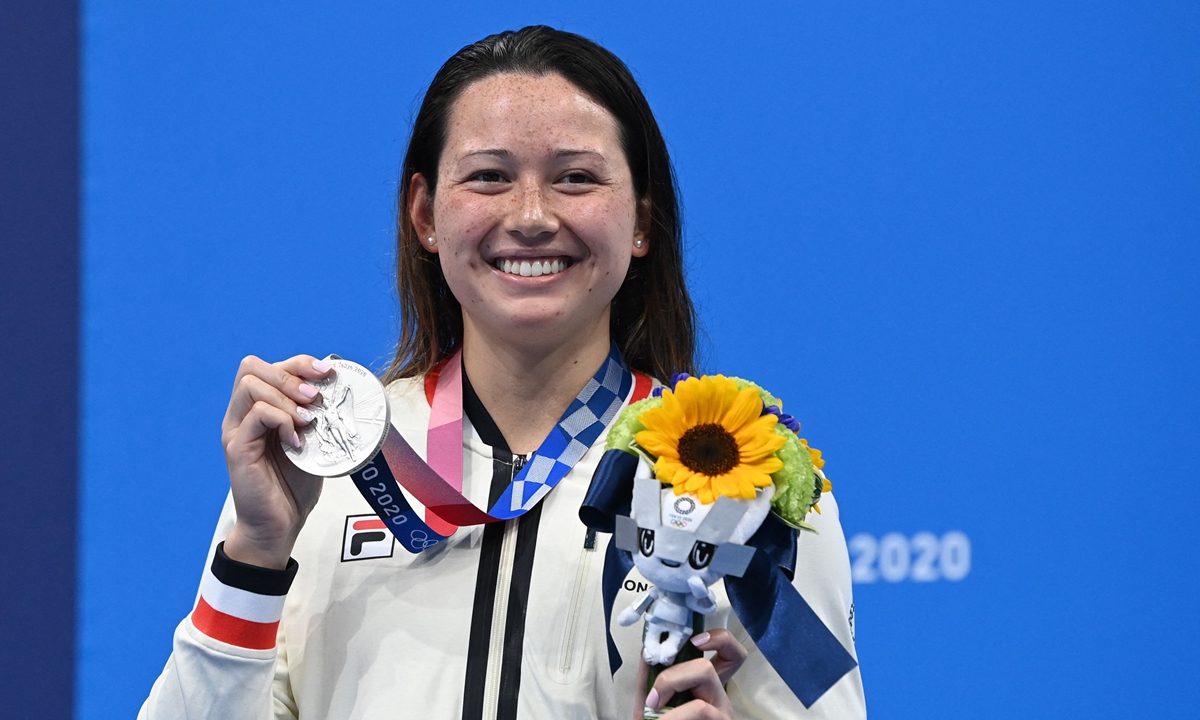 Haughey poses with her silver medal on the podium. Photo: VCG