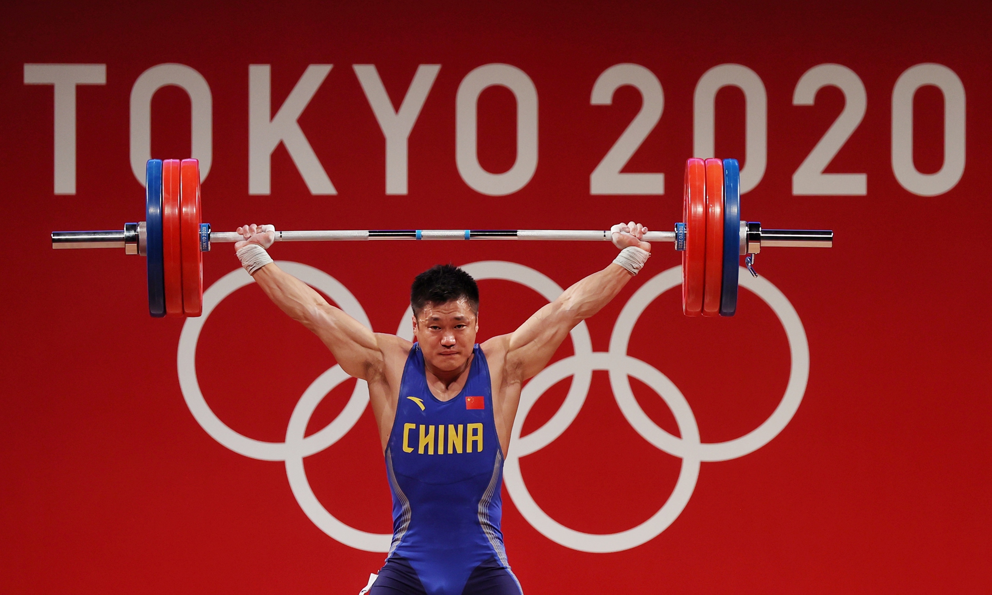 Live from Tokyo Lü Xiaojun wins gold in the mens 81kg weightlifting