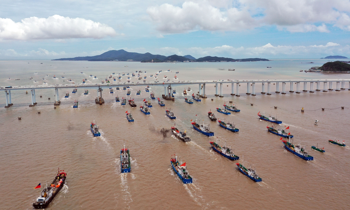 More than 2,000 ships restart fishing in Zhoushan, East China's Zhejiang Province on Sunday after a three-month break. A storm named Yanhua and floods in July also interrupted ships' work. Photo: cnsphoto