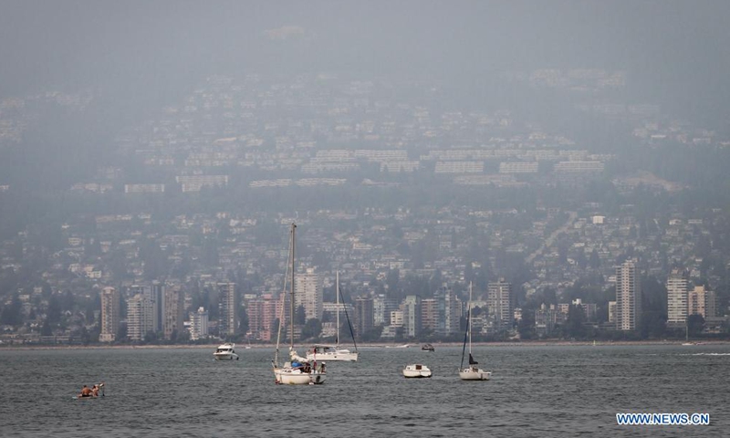 Wildfire smoke shrouds Vancouver, Canada, Aug. 1, 2021. Environmental Canada has issued a special air quality warning to metro Vancouver after the wildfire smoke arrived in Vancouver region. (Photo by Liang Sen/Xinhua)