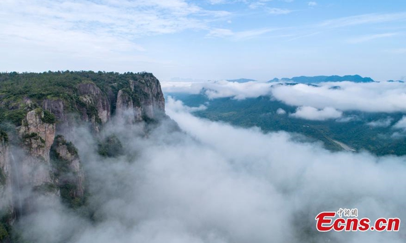 Photo taken on July 31, 2021 show mist and clouds turn the Xianju County in Zhejiang Province into a fairyland after rain. (Photo/Chen Yueming)

