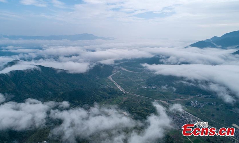 Photo taken on July 31, 2021 show mist and clouds turn the Xianju County in Zhejiang Province into a fairyland after rain. (Photo/Chen Yueming)

