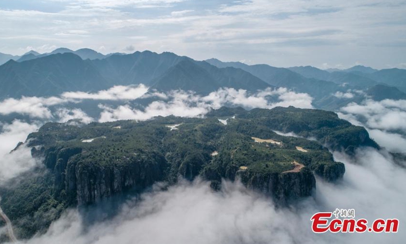 Photo taken on July 31, 2021 show mist and clouds turn the Xianju County in Zhejiang Province into a fairyland after rain. (Photo/Chen Yueming)

