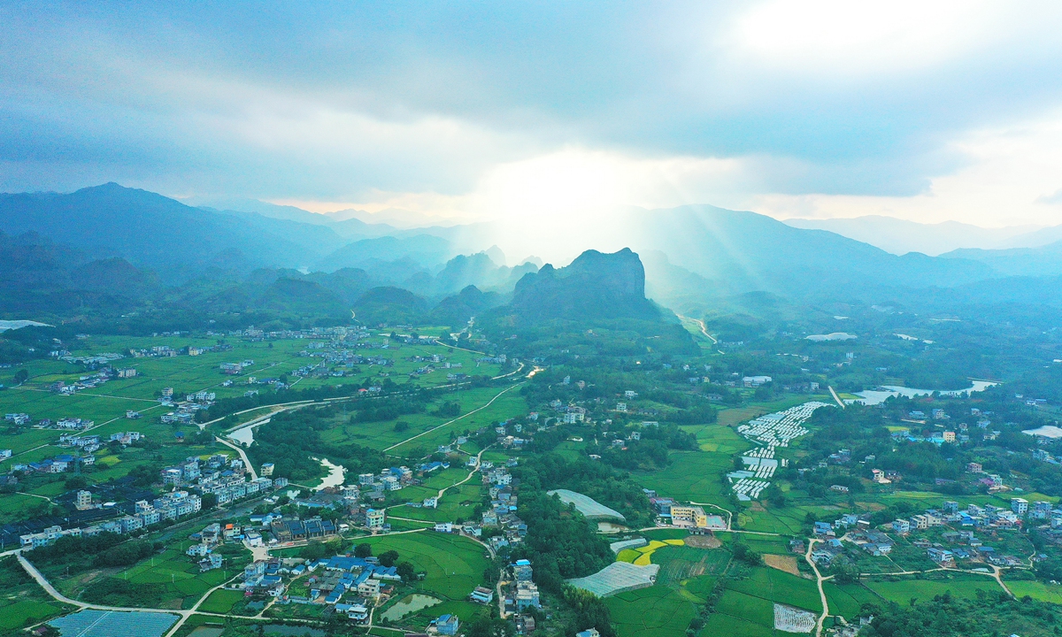 An aerial photo shot on Monday shows the natural beauty of a village in Huichang county in East China's Jiangxi Province. Huichang had been on the list of national-level poverty-stricken counties since 1986. The county shook off poverty in 2019 due to a massive poverty relief campaign. Photo: IC