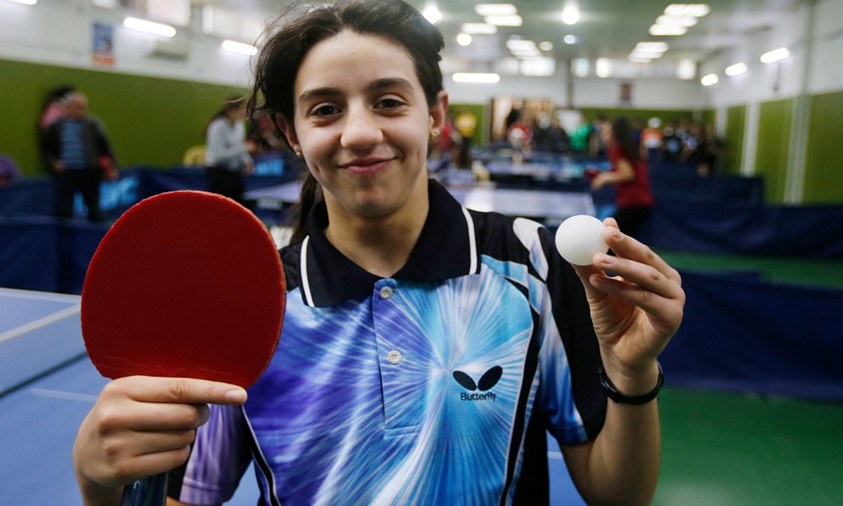 Syria's table tennis player Hind Zaza poses for a picture during the local clubs championship in the Syrian capital Damascus on March 13, 2020. Zaza, 12, qualified to the Tokyo 2020 Olympics after gaining the gold medal in the Asian championships in her category and was expected to be the youngest participant. Photo:VCG