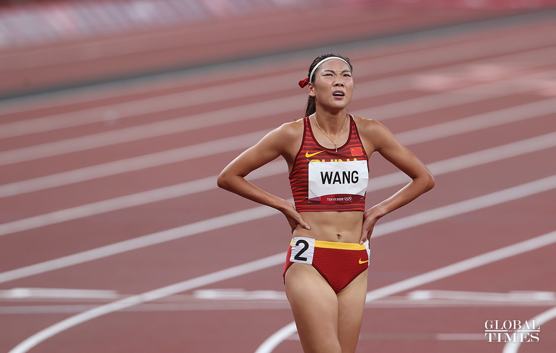 Live from Tokyo Chinese distance runner Wang Chunyu finished women's