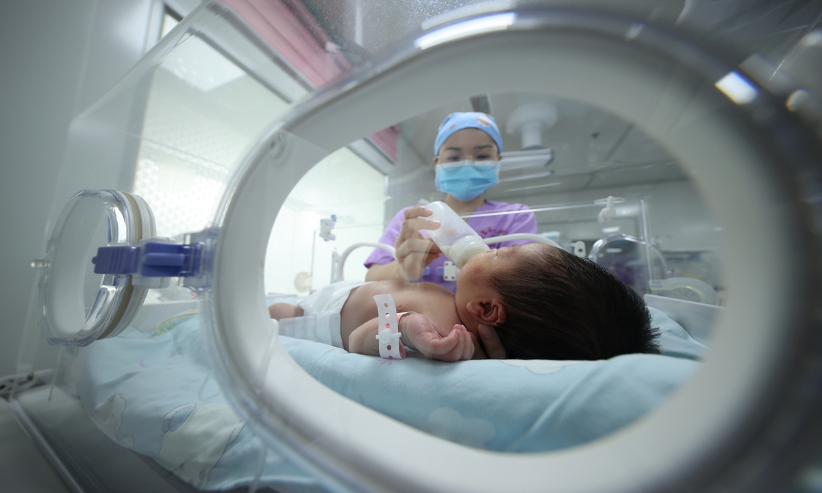 A new born baby in a hospital in China Photo: VCG