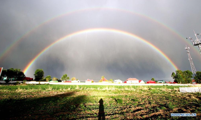 Photo taken on May 30, 2018 shows a double rainbow in Zhaosu County, northwest China's Xinjiang Uygur Autonomous Region. (Photo by Wang Liping/Xinhua)