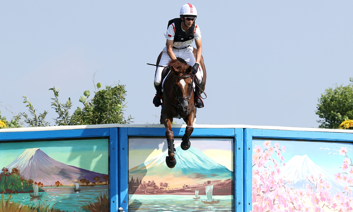 Hua Tian of China clears a jump during the Tokyo Olympics on August 1 in Tokyo, Japan. Photo: VCG