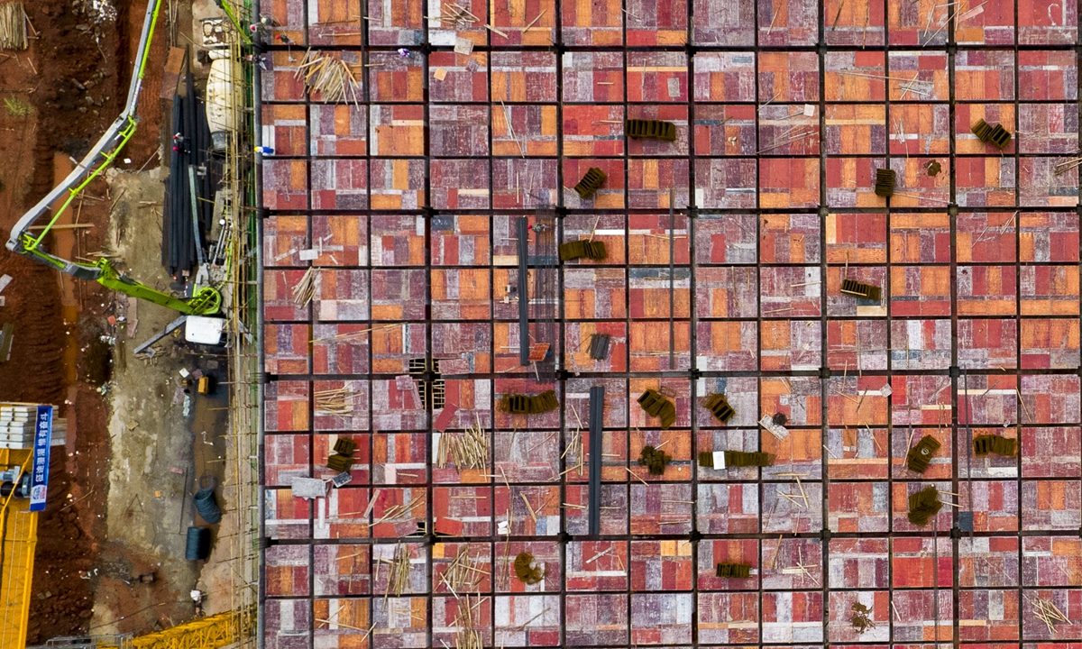 A lithium battery plant is seen under construction in Xinyu, East China's Jiangxi Province, on Thursday. It is expected to churn out 5 gigawatt hours of lithium batteries for new-energy vehicles per year, when put into operation. Photo: cnsphoto