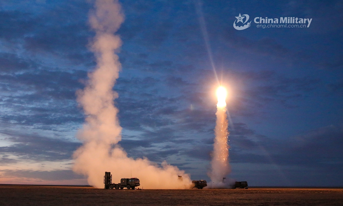 Medium-range air-defense missile system attached to a missile battalion of an air-defense brigade under the PLA 72nd Group Army fires a surface-to-air missile during a recent round-the-clock air-defense training exercise in northwest China’s Gobi desert.Photo:China Military