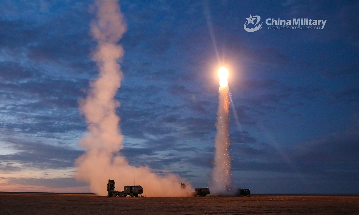 Medium-range air-defense missile system attached to a missile battalion of an air-defense brigade under the PLA 72nd Group Army fires a surface-to-air missile during a recent round-the-clock air-defense training exercise in northwest China's Gobi desert.Photo:China Military