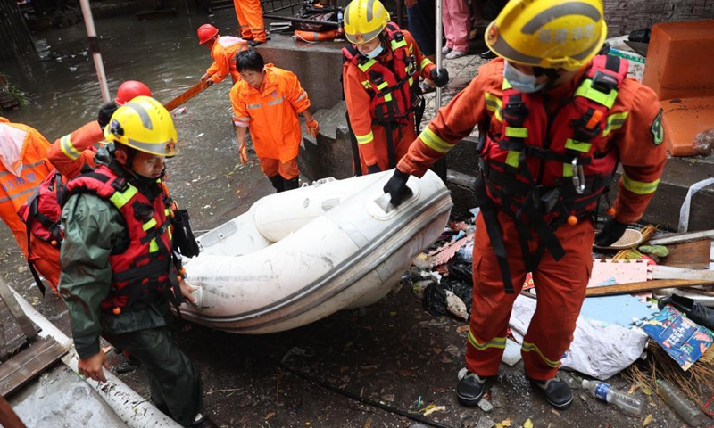 Firefighters carry out rescue operation in Jimei District of Xiamen, southeast China's Fujian Province, Aug. 5, 2021. Typhoon Lupit made its second landfall on Thursday in Fujian Province, bringing heavy downpours and forcing the evacuation of thousands. The local government has initiated an emergency response to flood and waterlogging amid torrential rains brought by Lupit.Photo:Xinhua