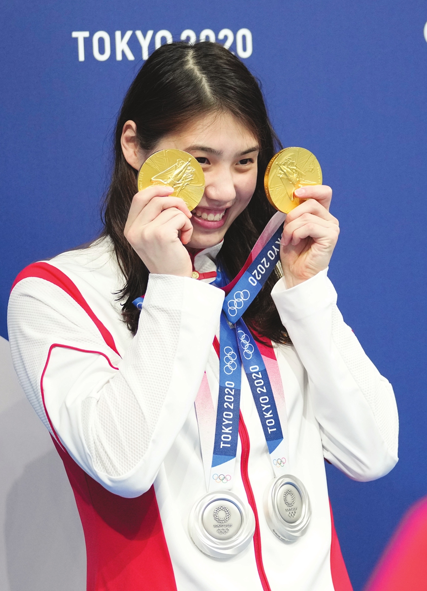 Zhang Yufei poses with the four medals she won at the Tokyo Olympics on August 1. Photo: IC