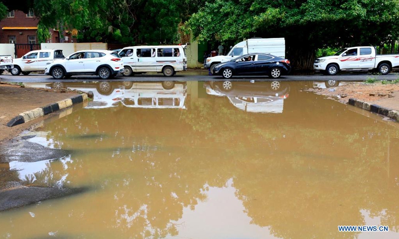 A waterlogged area is seen after heavy rain hit Khartoum, Sudan, Aug. 8, 2021. (Photo by Mohamed Khidir/Xinhua)