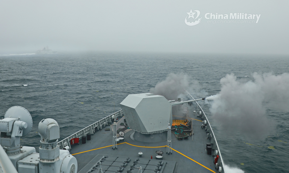 The guided-missile frigate Yantai (Hull 538) attached to a destroyer flotilla with the navy under the PLA Northern Theater Command fires its main gun at mock sea targets during a maritime live-fire training exercise in waters of the Yellow Sea in late July. The training exercise focused on subjects including striking maritime and aerial targets, joint search and rescue, anti-submarine operation, warship and airplane cooperative training. (eng.chinamil.com.cn/Photo by Du Jiangfan)