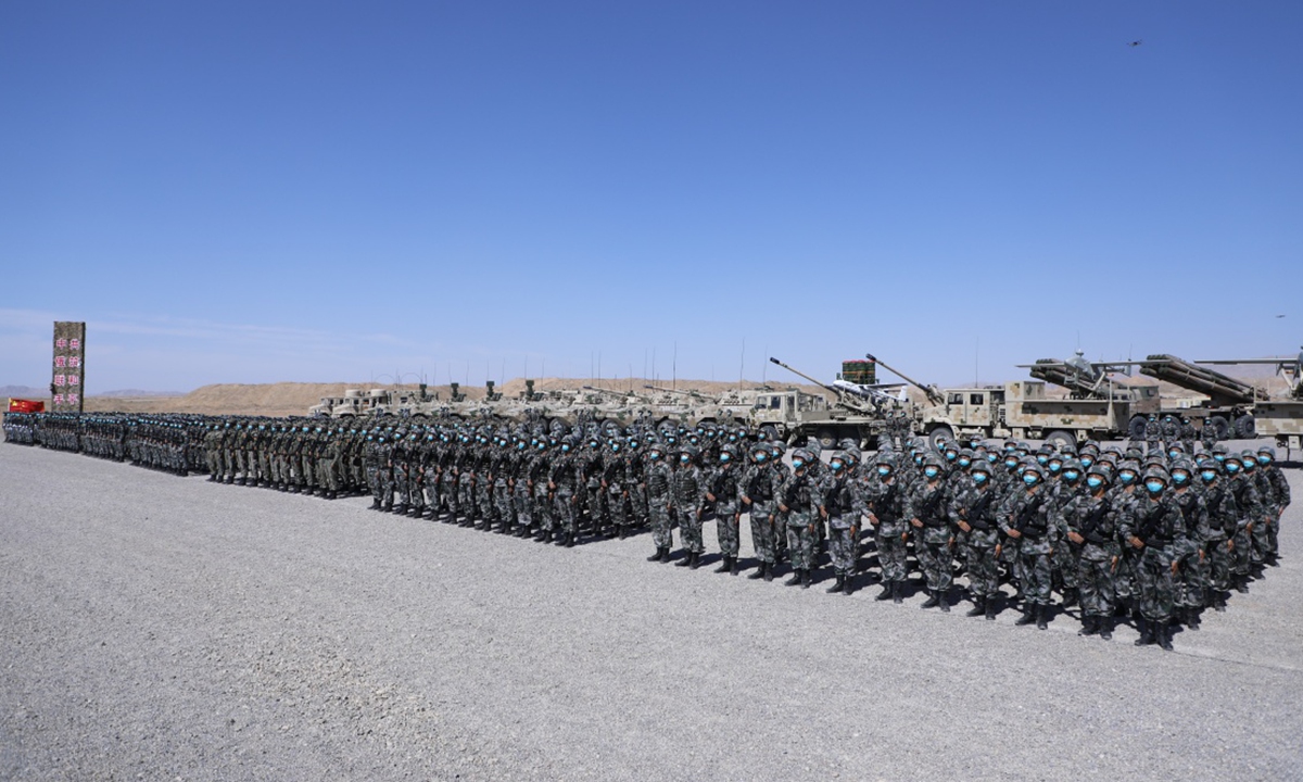 The exercise ZAPAD/INTERACTION-2021 kicks off at a combined arms tactical training base of the PLA Army in Qingtongxia City of West China's Ningxia Hui Autonomous Region on August 9, 2021. Pictures show that the participating troops from China and Russia parade at the launch ceremony in 13 ground phalanxes, together with two air echelons. (eng.chinamil.com.cn/Photo by Liu Fang)