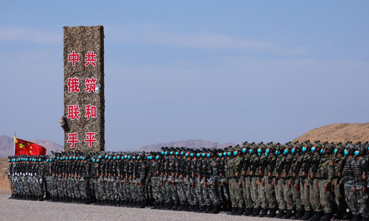 The exercise ZAPAD/INTERACTION-2021 kicks off at a combined arms tactical training base of the PLA Army in Qingtongxia City of West China's Ningxia Hui Autonomous Region on August 9, 2021. Pictures show that the participating troops from China and Russia parade at the launch ceremony in 13 ground phalanxes, together with two air echelons. (eng.chinamil.com.cn/Photo by Liu Fang)