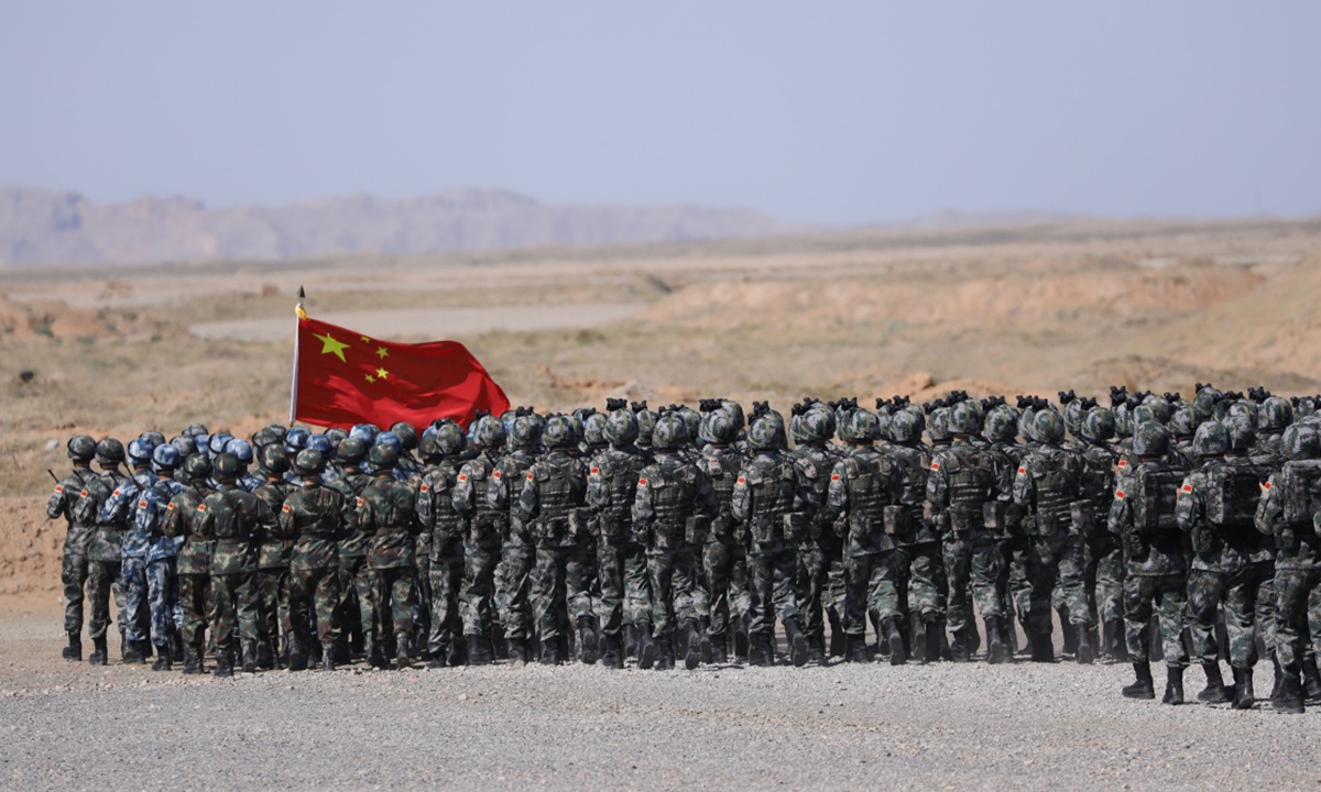 The exercise ZAPAD/INTERACTION-2021 kicks off at a combined arms tactical training base of the PLA Army in Qingtongxia City of West China's Ningxia Hui Autonomous Region on August 9, 2021. Pictures show that the participating troops from China and Russia parade at the launch ceremony in 13 ground phalanxes, together with two air echelons. (eng.chinamil.com.cn/Photo by Liu Fang)