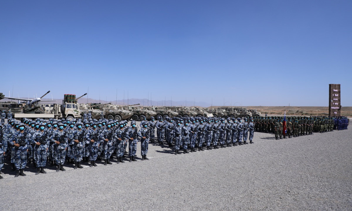 The exercise ZAPAD/INTERACTION-2021 kicks off at a combined arms tactical training base of the PLA Army in Qingtongxia City of West China's Ningxia Hui Autonomous Region on August 9, 2021. Pictures show that the participating troops from China and Russia parade at the launch ceremony in 13 ground phalanxes, together with two air echelons. (eng.chinamil.com.cn/Photo by Liu Fang)