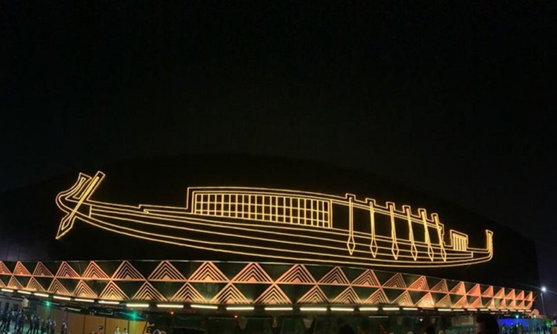 A specialized large vehicle carrying the first Khufu solar boat is on the way to the Grand Egyptian Museum at the Giza Pyramids scenic spot in Giza, Egypt, Aug. 6, 2021.(Photo: Xinhua)