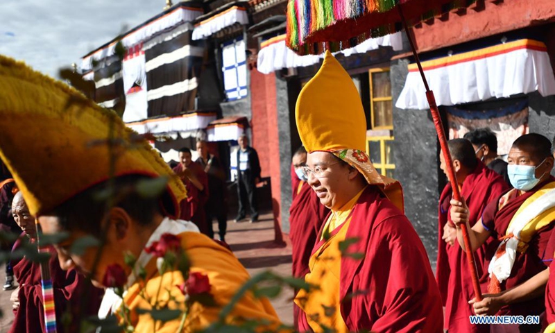 The 11th Panchen Lama, Bainqen Erdini Qoigyijabu, also a member of the Standing Committee of the National Committee of the Chinese People's Political Consultative Conference, vice president of the Buddhist Association of China and president of the association's Tibet branch, visits the Tashilhunpo Monastery in Xigaze, southwest China's Tibet Autonomous Region, Aug. 9, 2021. The 11th Panchen Lama visited the Tashilhunpo Monastery on Sunday and Monday.(Photo: Xinhua)