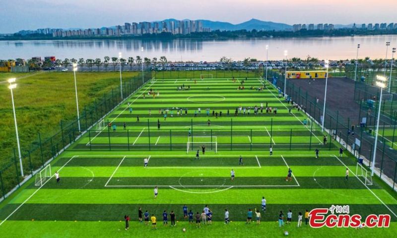 Yuliangzhou, an economic development zone in the central of Xiangyang City, is planted with lawn and green trees, Xiangyang, Hubei Province, August 10, 2021. (Photo/ Yang Dong) 

Xiangyang has launched several ecological restoration projects in recent years, which improves the ecosystem in Yuliangzhou. It is now served as a multifunction zone for residents to enjoy vacations, have short-term travel, or hold athletic activities.
