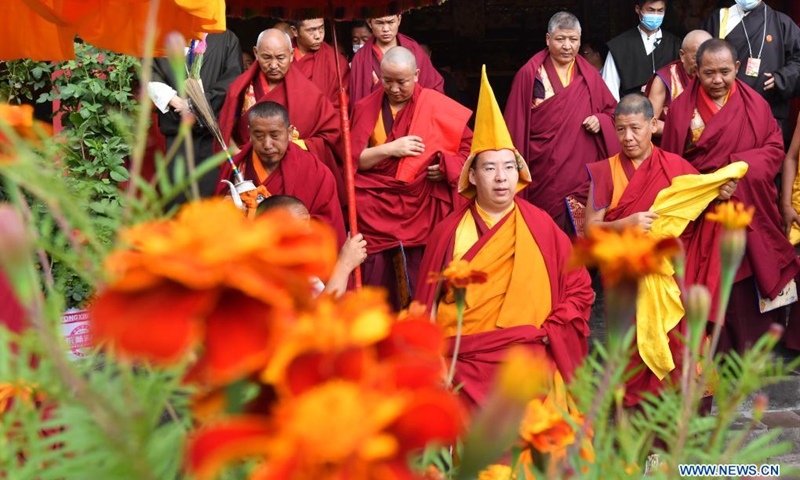 The 11th Panchen Lama, Bainqen Erdini Qoigyijabu, also a member of the Standing Committee of the National Committee of the Chinese People's Political Consultative Conference, vice president of the Buddhist Association of China and president of the association's Tibet branch, visits the Tashilhunpo Monastery in Xigaze, southwest China's Tibet Autonomous Region, Aug. 9, 2021. The 11th Panchen Lama visited the Tashilhunpo Monastery on Sunday and Monday.(Photo: Xinhua)