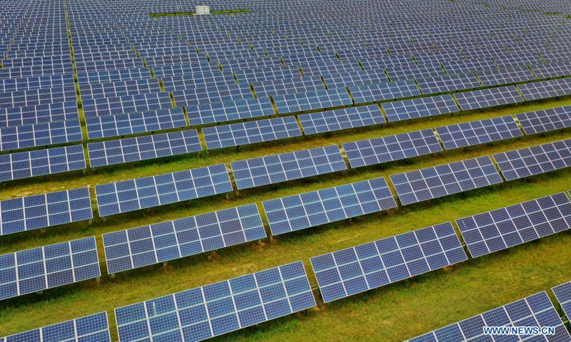 Aerial photo taken on Aug. 3, 2021 shows a photovoltaic power station in Tujing Village, Yunzhou District of Datong City, north China's Shanxi Province. The photovoltaic power station, built upon 1,851 mu (123.4 hectares) of saline-alkaline land, generates over 80 million KWH of power per year.(Phhoto: Xinhua)