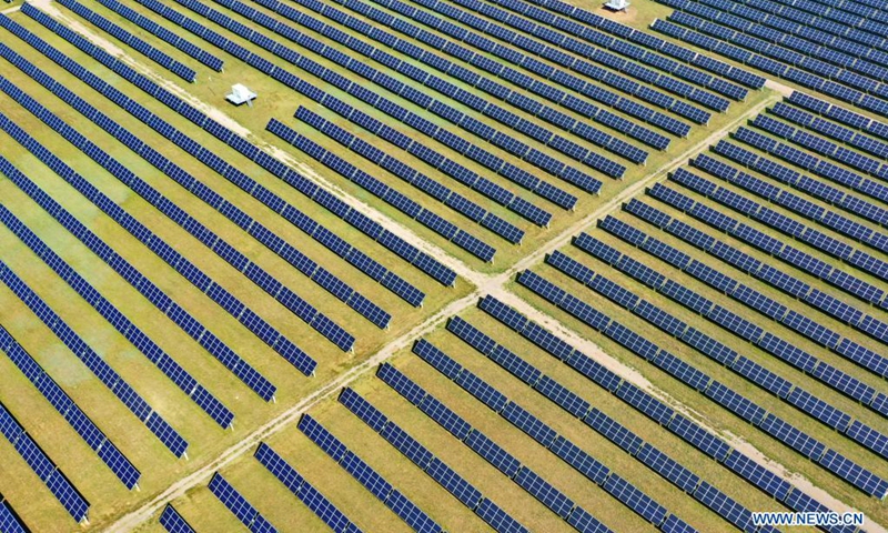 Aerial photo taken on Aug. 3, 2021 shows a photovoltaic power station in Tujing Village, Yunzhou District of Datong City, north China's Shanxi Province. The photovoltaic power station, built upon 1,851 mu (123.4 hectares) of saline-alkaline land, generates over 80 million KWH of power per year.(Phhoto: Xinhua)