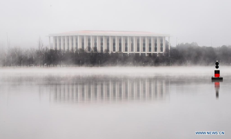 Photo taken on Aug. 15, 2021 shows the National Library of Australia in thick fog in Canberra, Australia. (Xinhua/Liu Changchang)