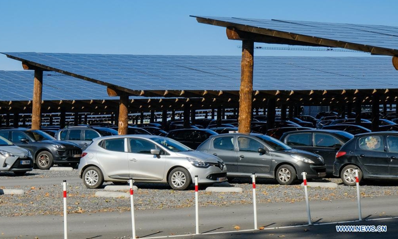 Photo taken on Aug. 11, 2021 shows the photovoltaic parking lot of Pairi Daiza zoo in Brugelette, Belgium. The large photovoltaic parking lot with over 60,000 overhead solar panels can not only provide some 7,000 parking spots and also offer a total power of 20 megawatt peak (MWp) that is more than the zoo needs. (Xinhua/Zhang Cheng) 