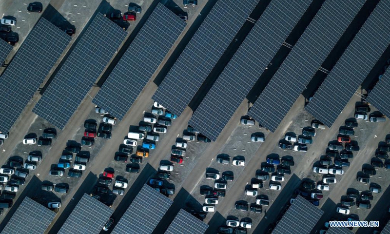 Aerial photo taken on Aug. 11, 2021 shows the photovoltaic parking lot of Pairi Daiza zoo in Brugelette, Belgium. The large photovoltaic parking lot with over 60,000 overhead solar panels can not only provide some 7,000 parking spots and also offer a total power of 20 megawatt peak (MWp) that is more than the zoo needs. (Xinhua/Zhang Cheng)