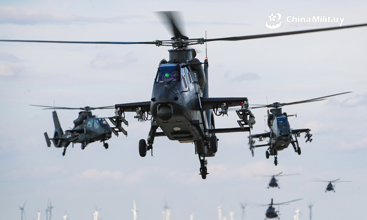 A cluster of attack helicopters attached to a brigade under the PLA 81st Group Army lift off successively and fly to a predetermined operational area at ultra-low attitude during a live-fire combat training exercise on July 28, 2021.Photo:China Military