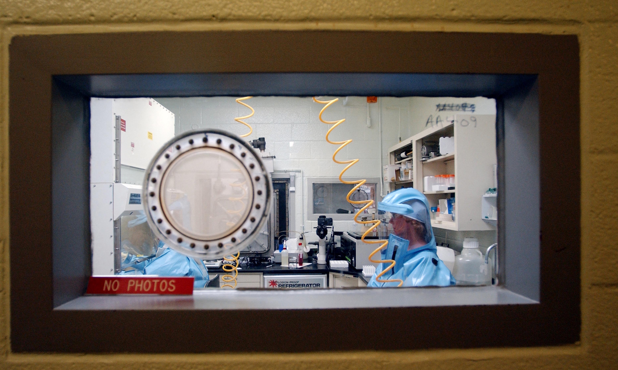 Personnel work inside the bio-level 4 lab research at the US Army Medical Research Institute of Infectious Diseases at Fort Detrick. Photo: AFP