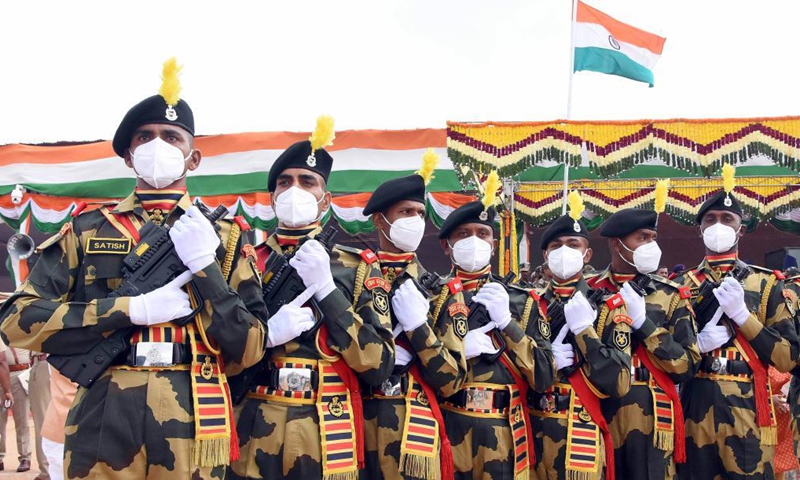 Indian Police and Border Security Force (BSF) personnel march during India's Independence Day celebrations at the Manek Shaw Parade Grounds, in Bangalore, India, Aug. 15, 2021. (Str/Xinhua) 