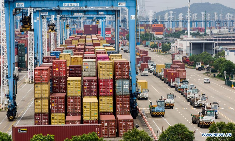 Photo taken on Aug. 15, 2021 shows a view of the Ningbo-Zhoushan Port in Ningbo, east China's Zhejiang Province. The Ningbo-Zhoushan Port saw its container throughput reach 20 million TEUs (Twenty-foot Equivalent Units) on Sunday, one month earlier than last year.(Photo: Xinhua)